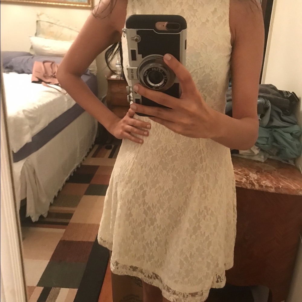 ASOS XS white dress. Beautiful lace pattern and cute buttons on the back.